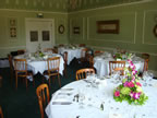 White Chair Covers and Chocolate Taffeta Sash